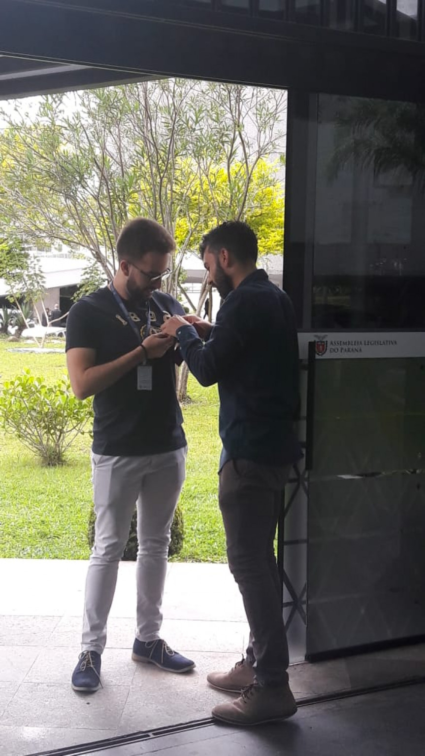 Ação coordenada pelo gabinete da deputada estadual Luciana Rafagnin em referência ao Dia do Laço Branco.